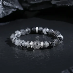 Featuring authentic Silver Sheen Obsidian, known for its protective energy and mesmerizing lunar glow.